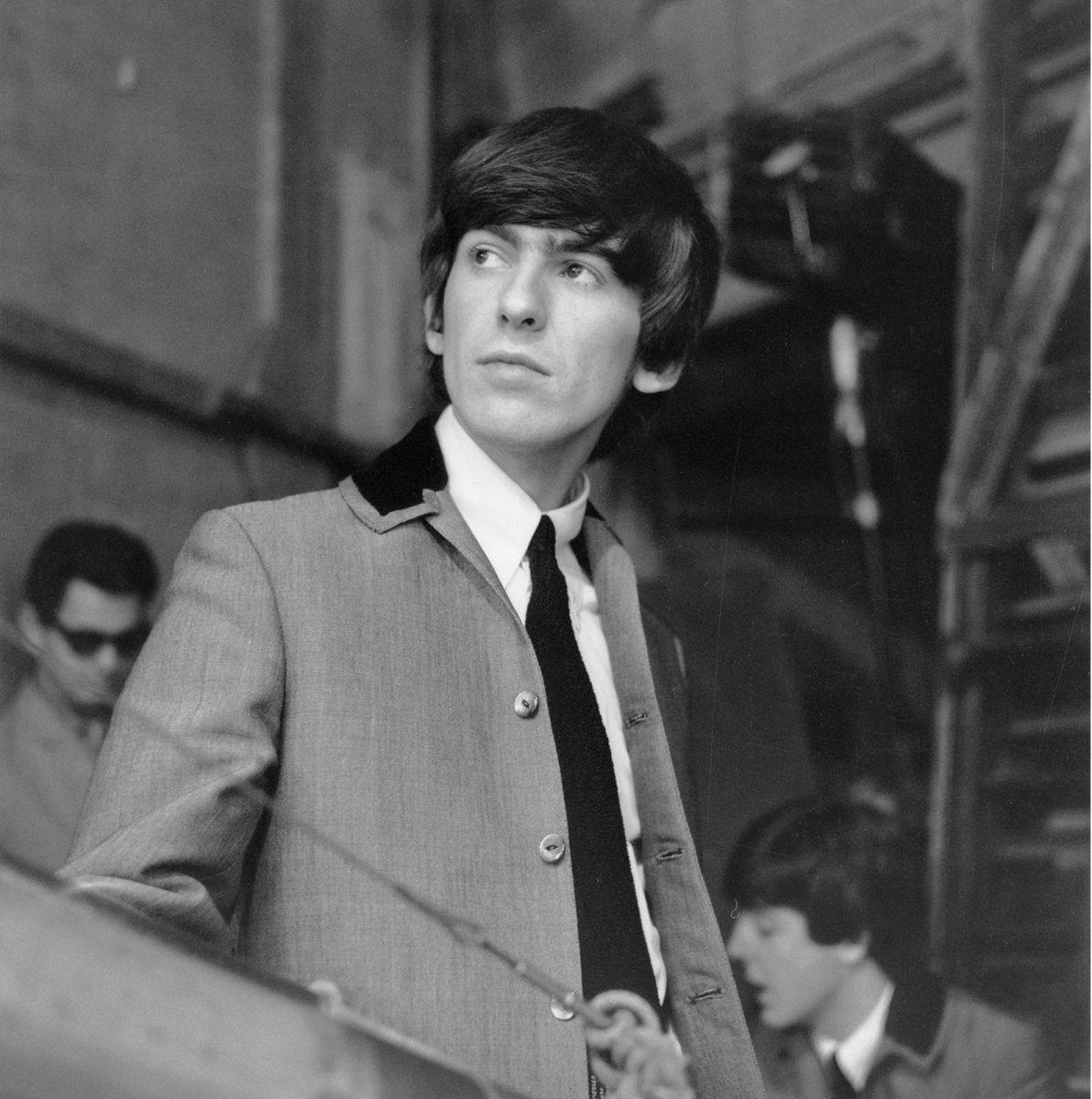 The Beatles’ “A Hard Day’s Night”Light silver-grey suits|George Harrison