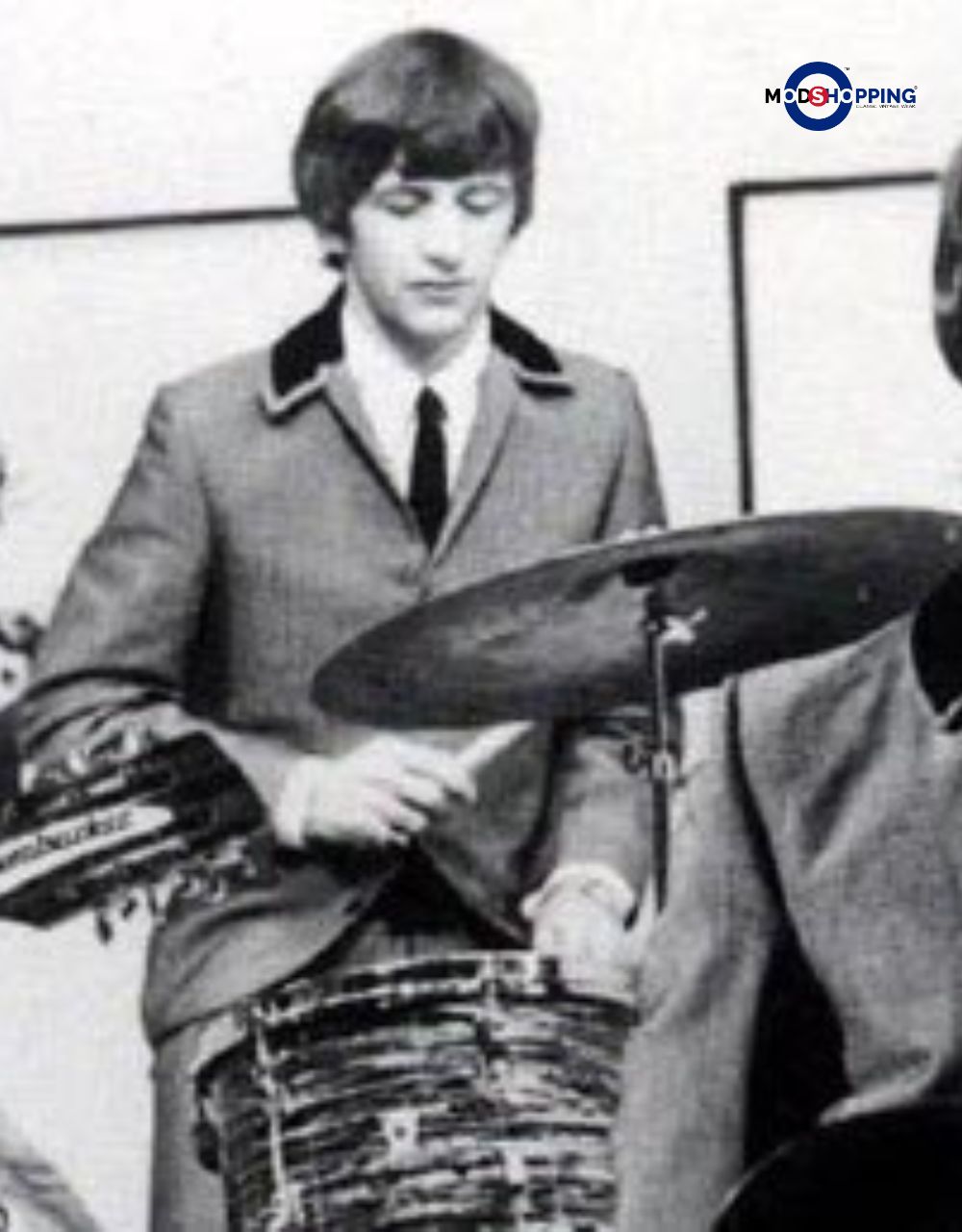 The Beatles’ “A Hard Day’s Night”Light silver-grey suits|George Harrison
